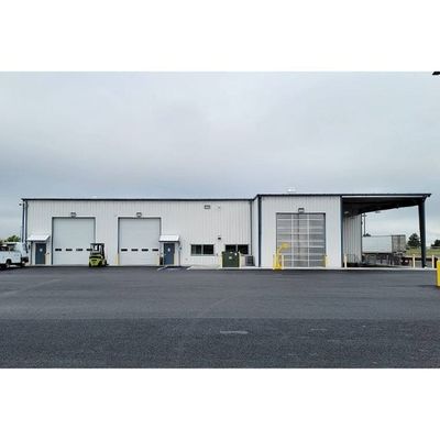 El palmo ancho H emite la casa prefabricada de Warehouse de la estructura de acero ignifuga con el panel de bocadillo